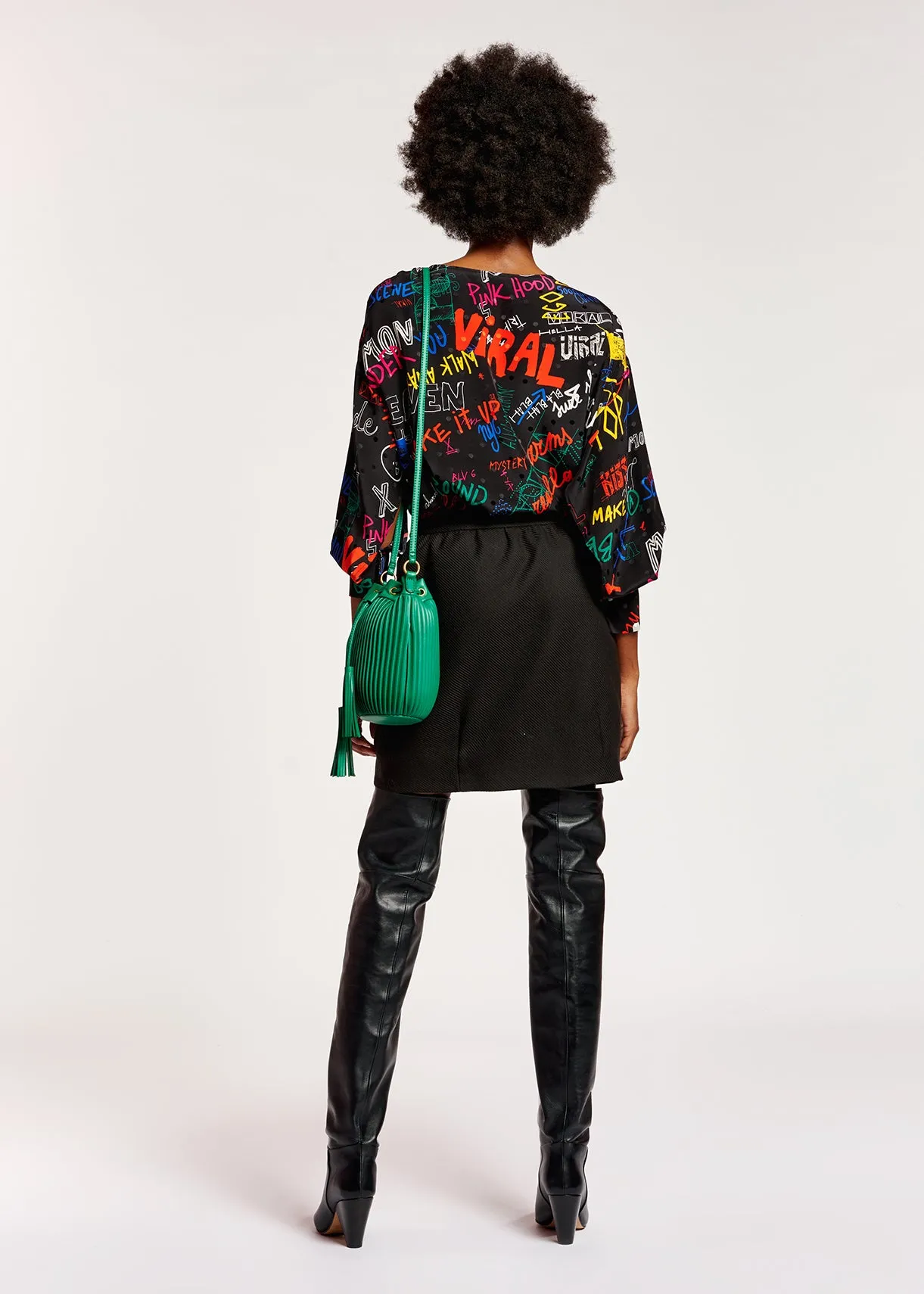 Black silk top with colorful tekst print