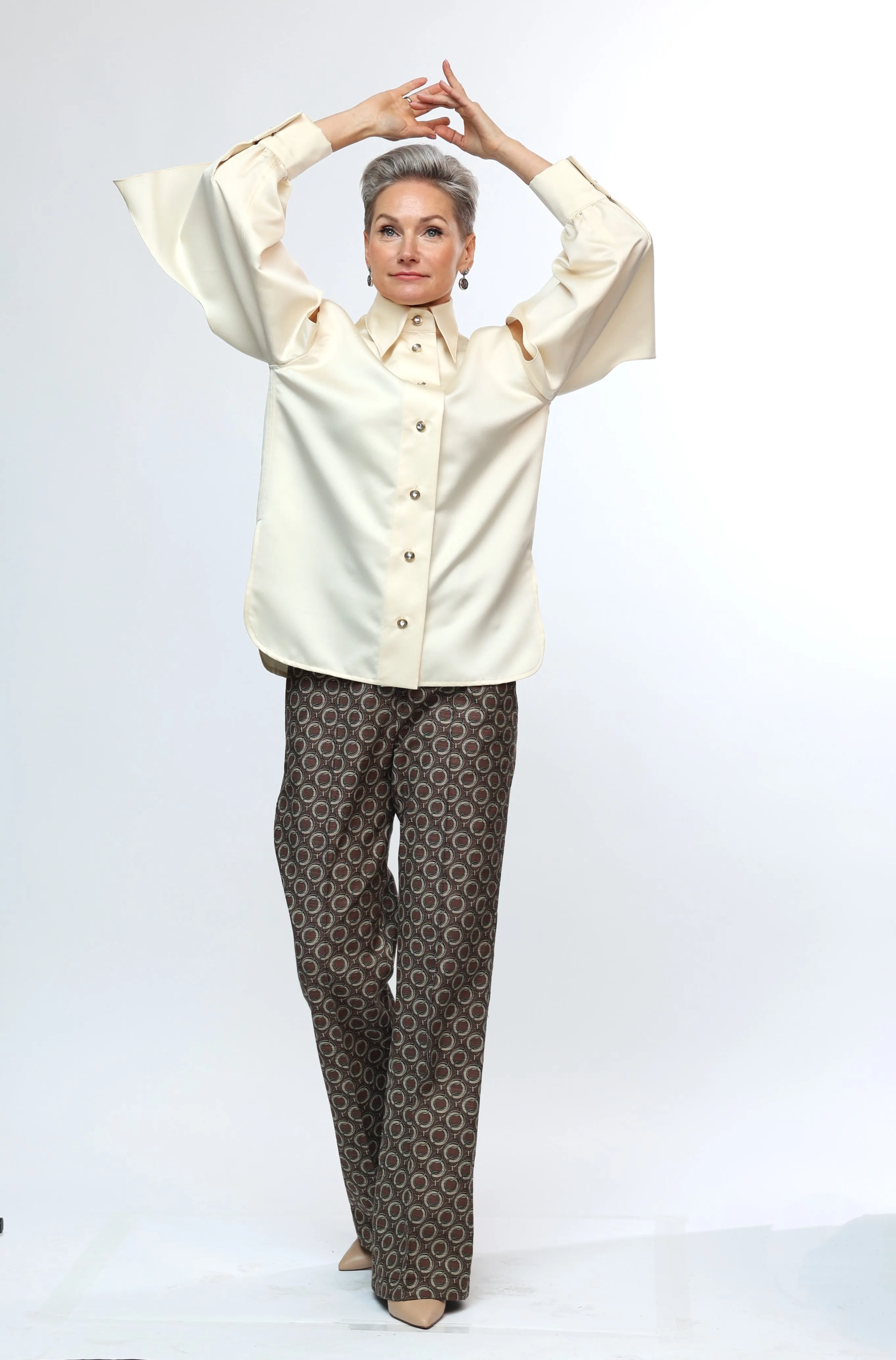 BLOUSE WITH TORN SLEEVES