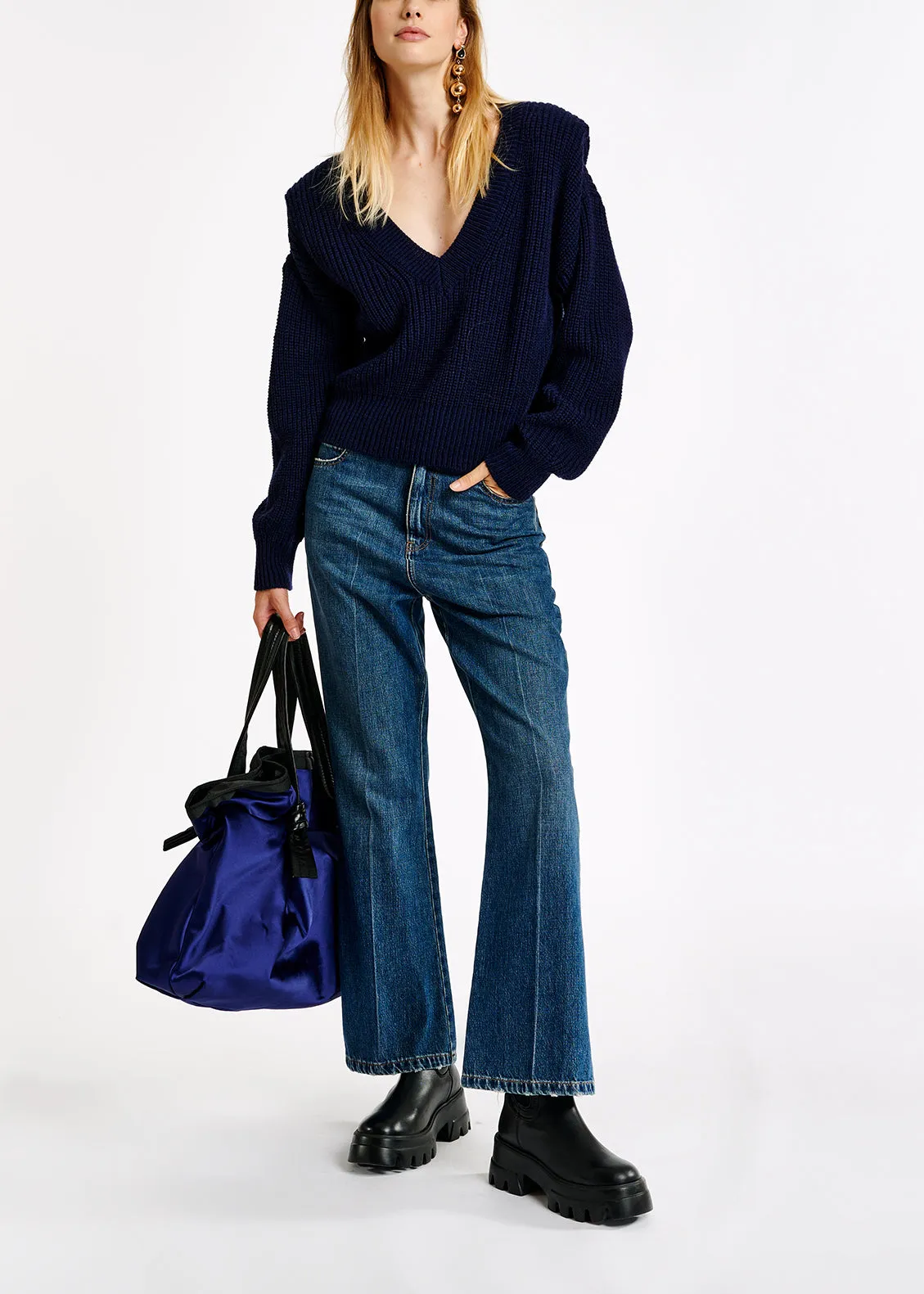 Dark blue sweater with padded shoulders