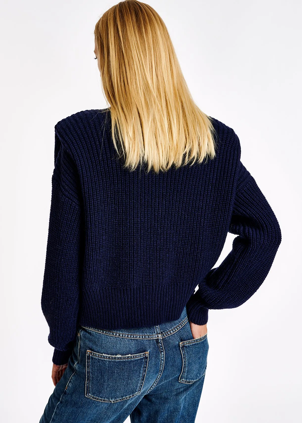 Dark blue sweater with padded shoulders