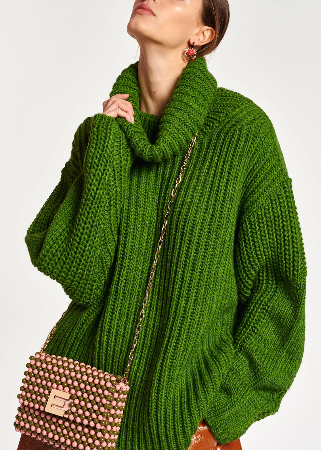Green chunky ribbed turtleneck sweater