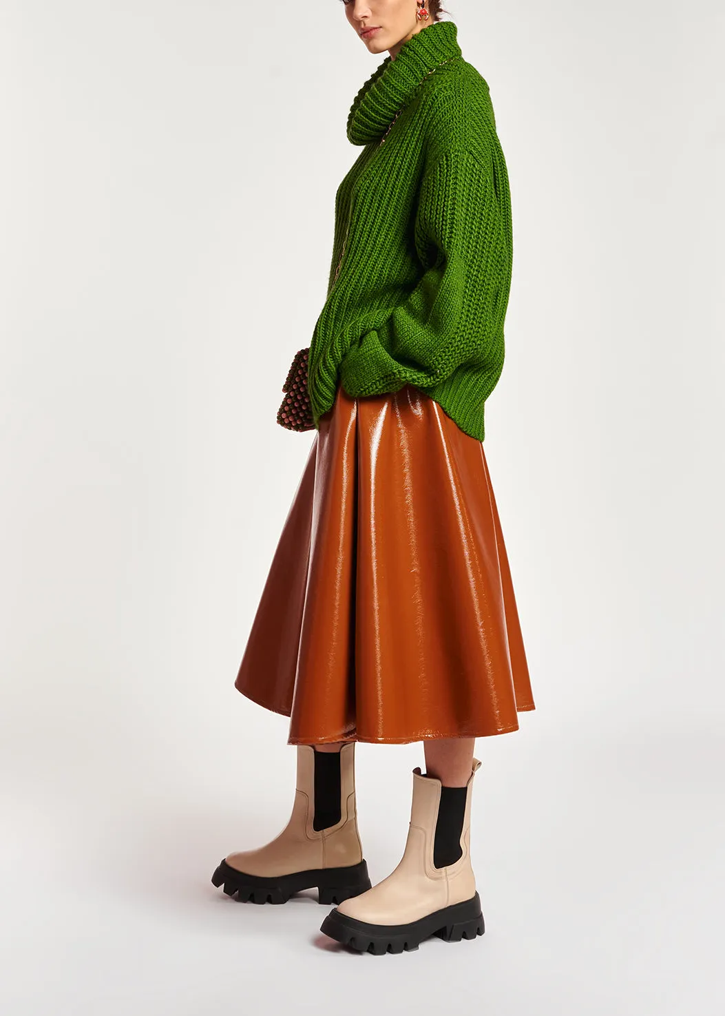 Green chunky ribbed turtleneck sweater