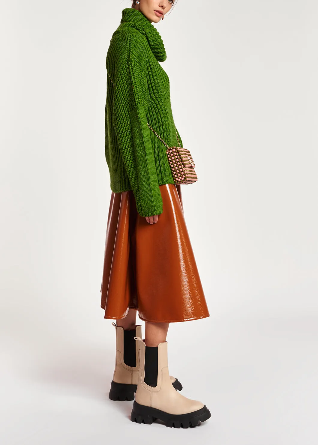 Green chunky ribbed turtleneck sweater