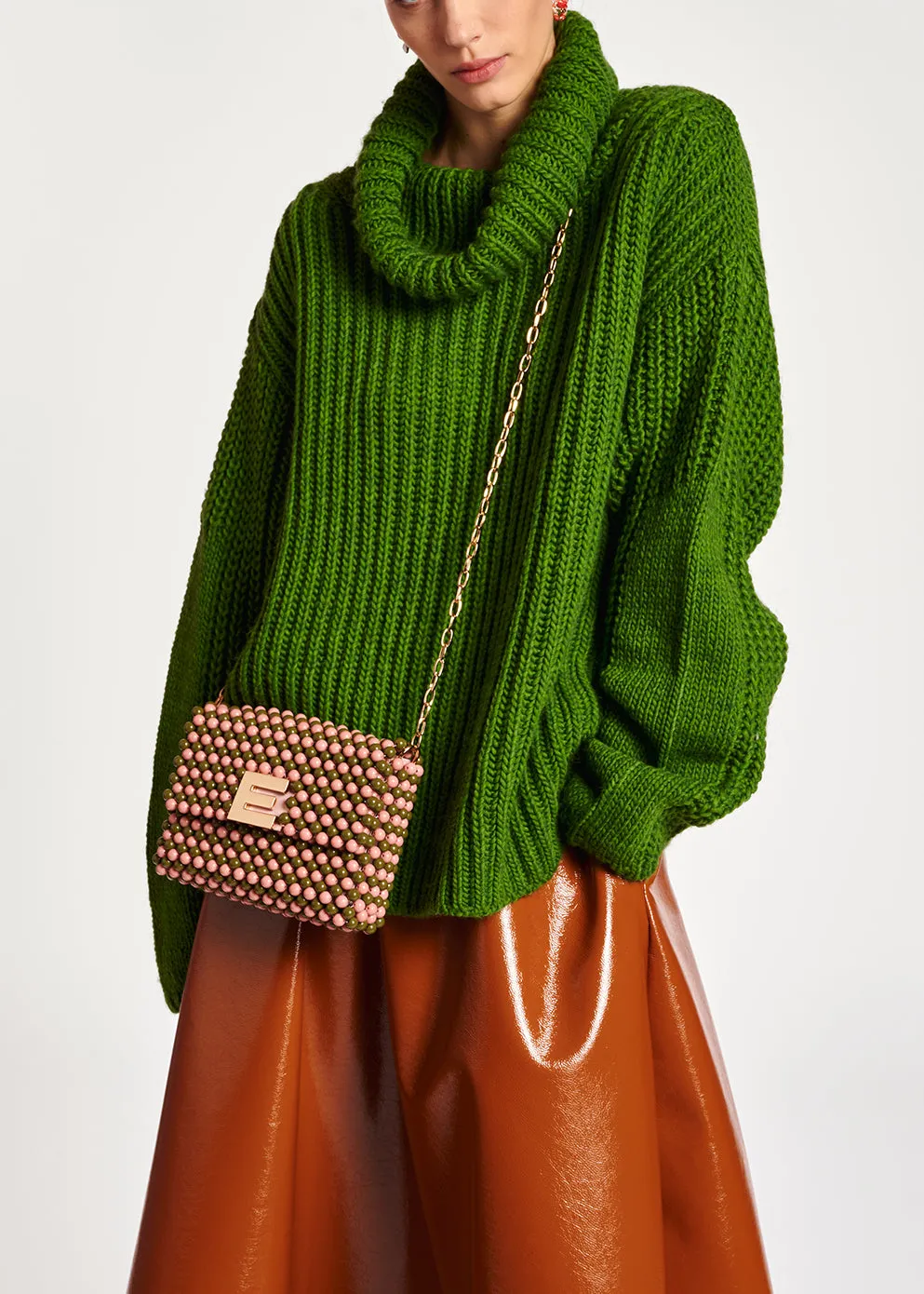 Green chunky ribbed turtleneck sweater