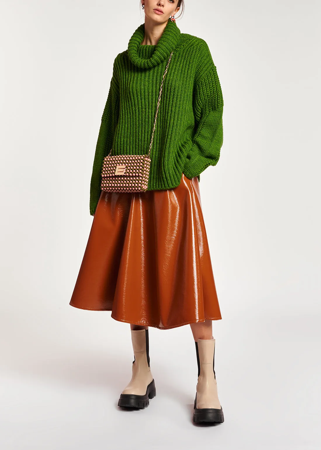 Green chunky ribbed turtleneck sweater