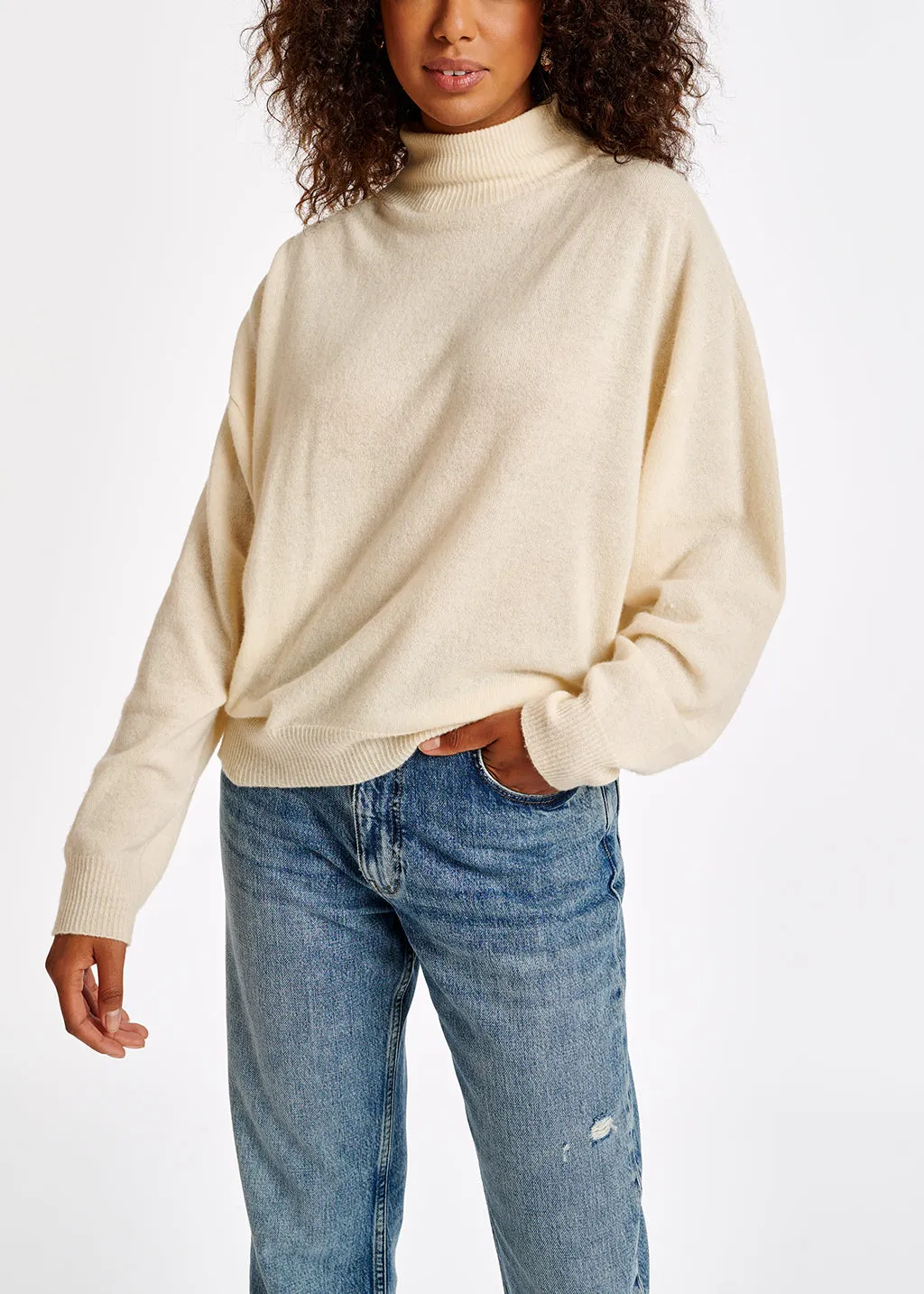 Off-white merino wool blend turtleneck sweater