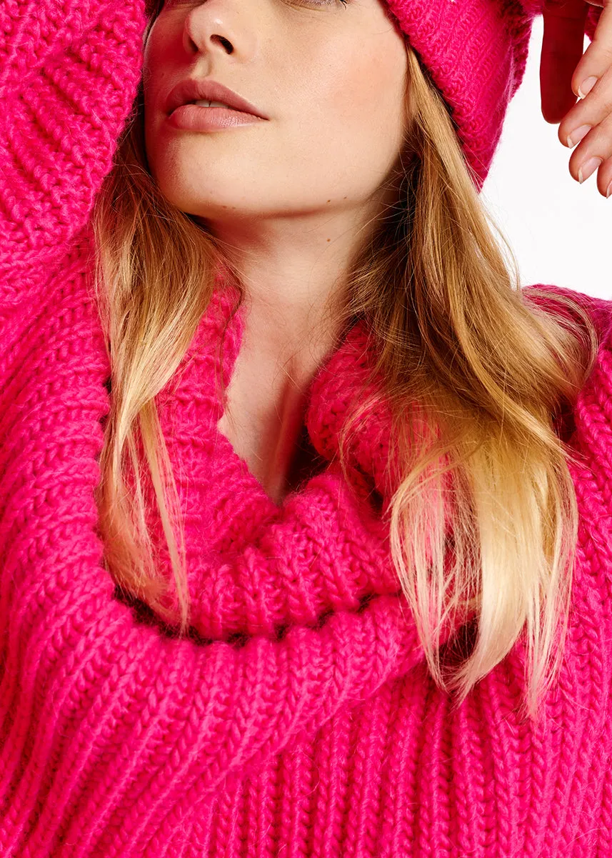 Pink chunky ribbed turtleneck sweater