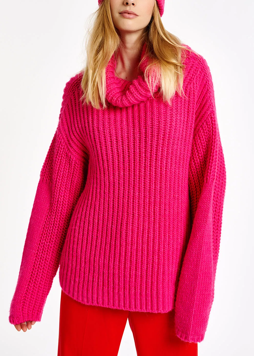 Pink chunky ribbed turtleneck sweater