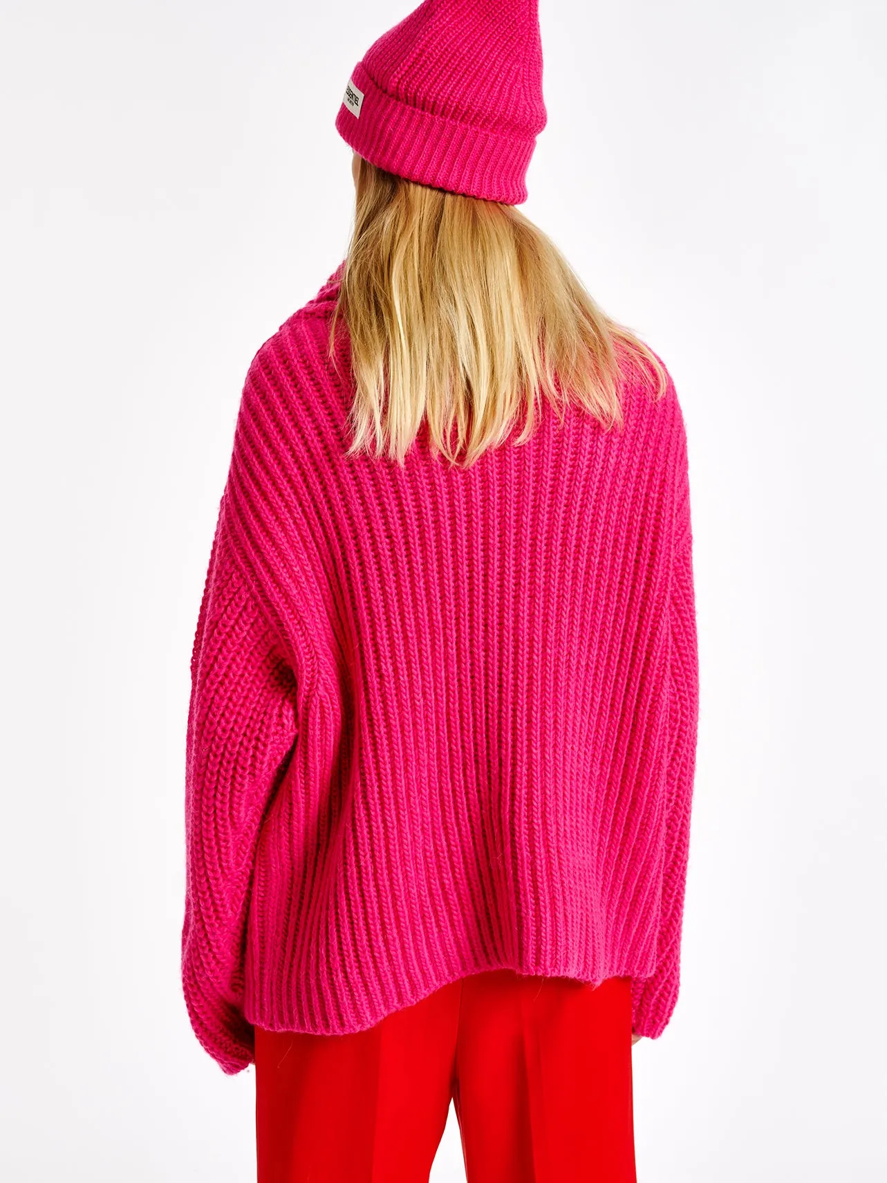 Pink chunky ribbed turtleneck sweater
