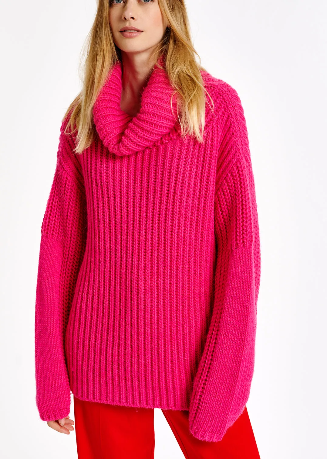 Pink chunky ribbed turtleneck sweater