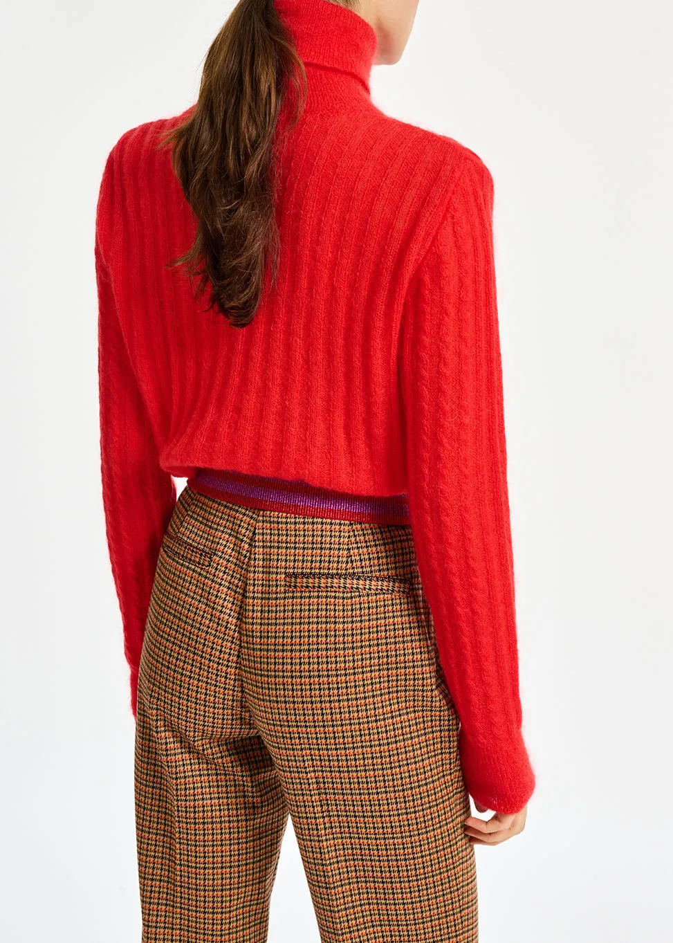 Red cable-knitted turtleneck sweater