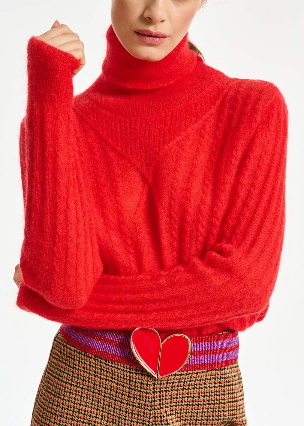 Red cable-knitted turtleneck sweater