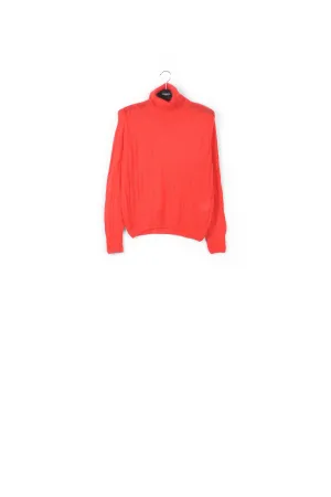 Red cable-knitted turtleneck sweater