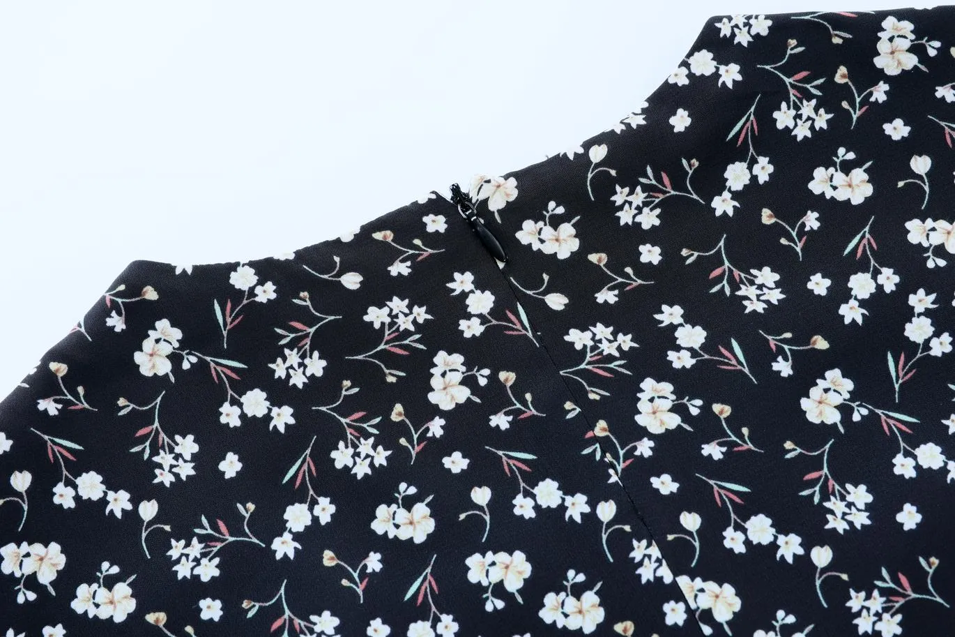 Stunning V-Neck Black Tea Tea Dress with Floral Design