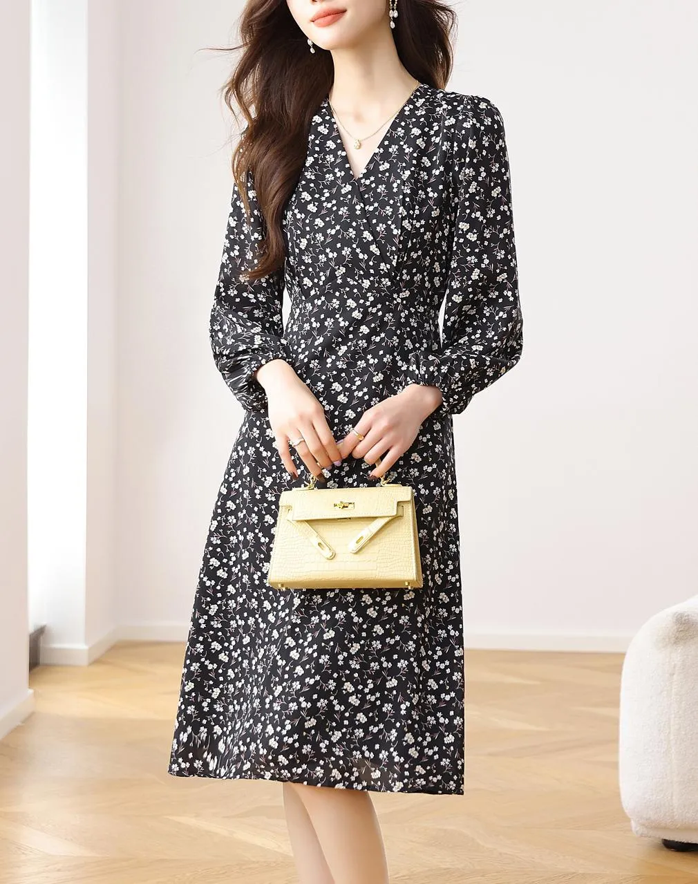 Stunning V-Neck Black Tea Tea Dress with Floral Design