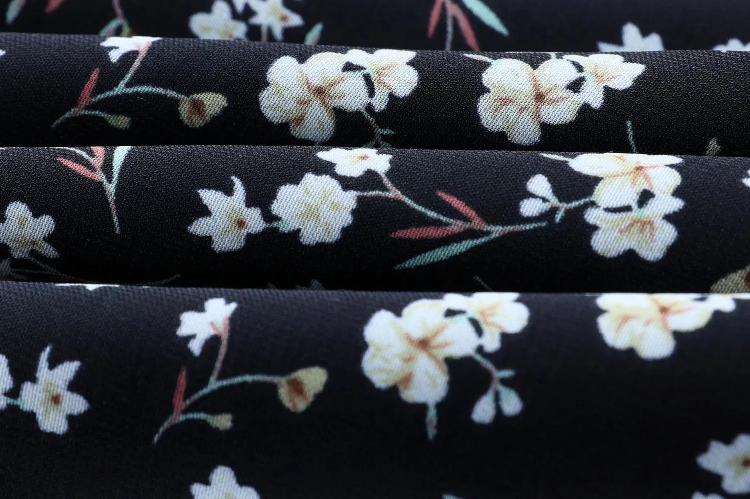 Stunning V-Neck Black Tea Tea Dress with Floral Design