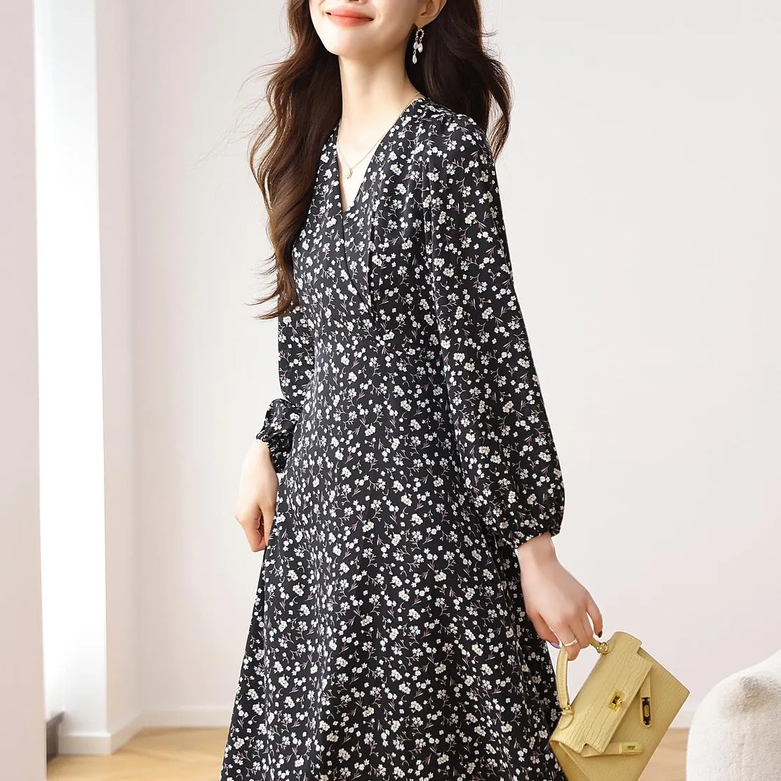 Stunning V-Neck Black Tea Tea Dress with Floral Design