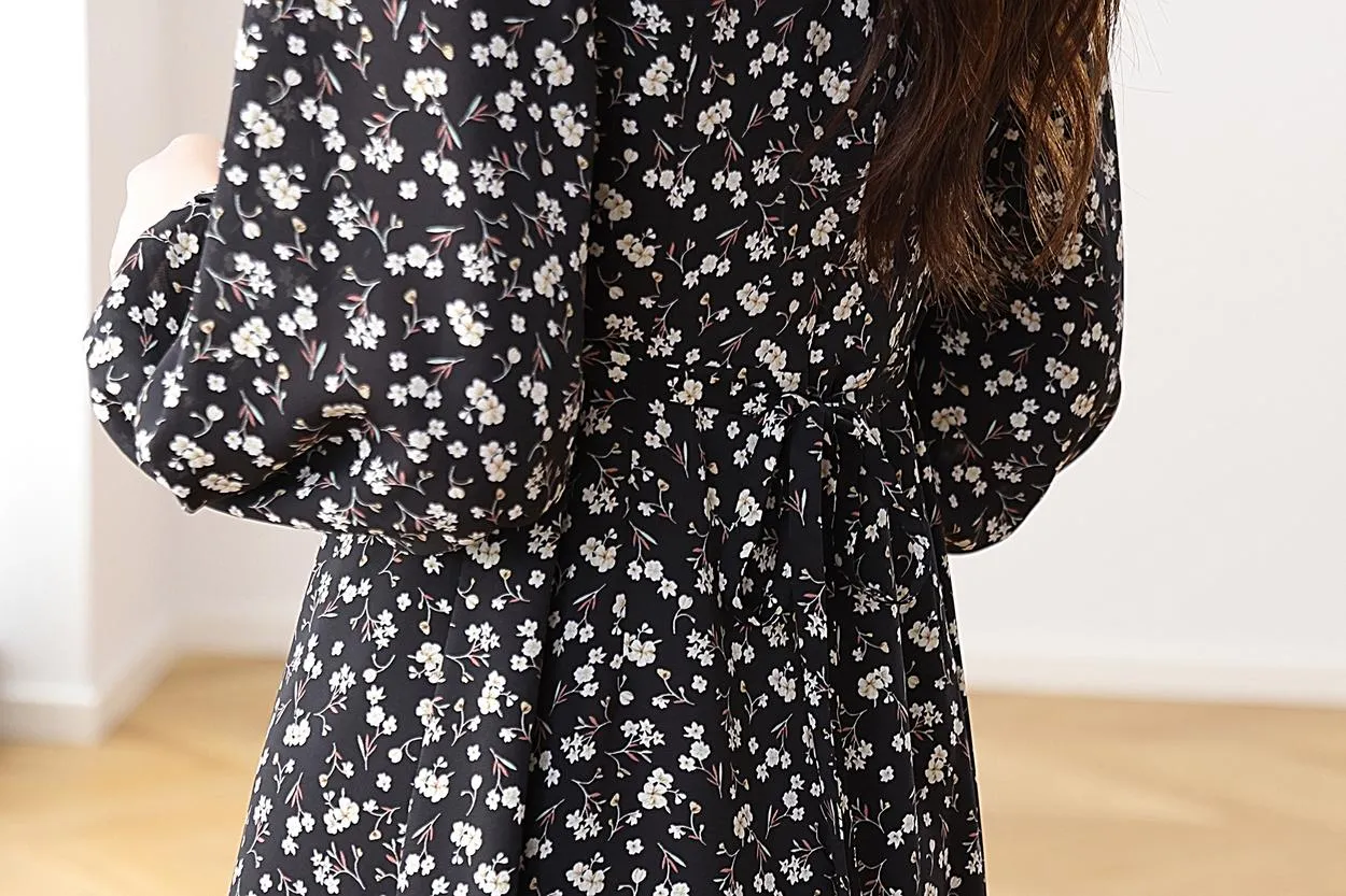 Stunning V-Neck Black Tea Tea Dress with Floral Design