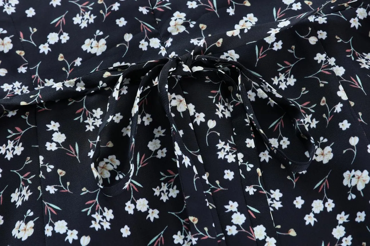 Stunning V-Neck Black Tea Tea Dress with Floral Design