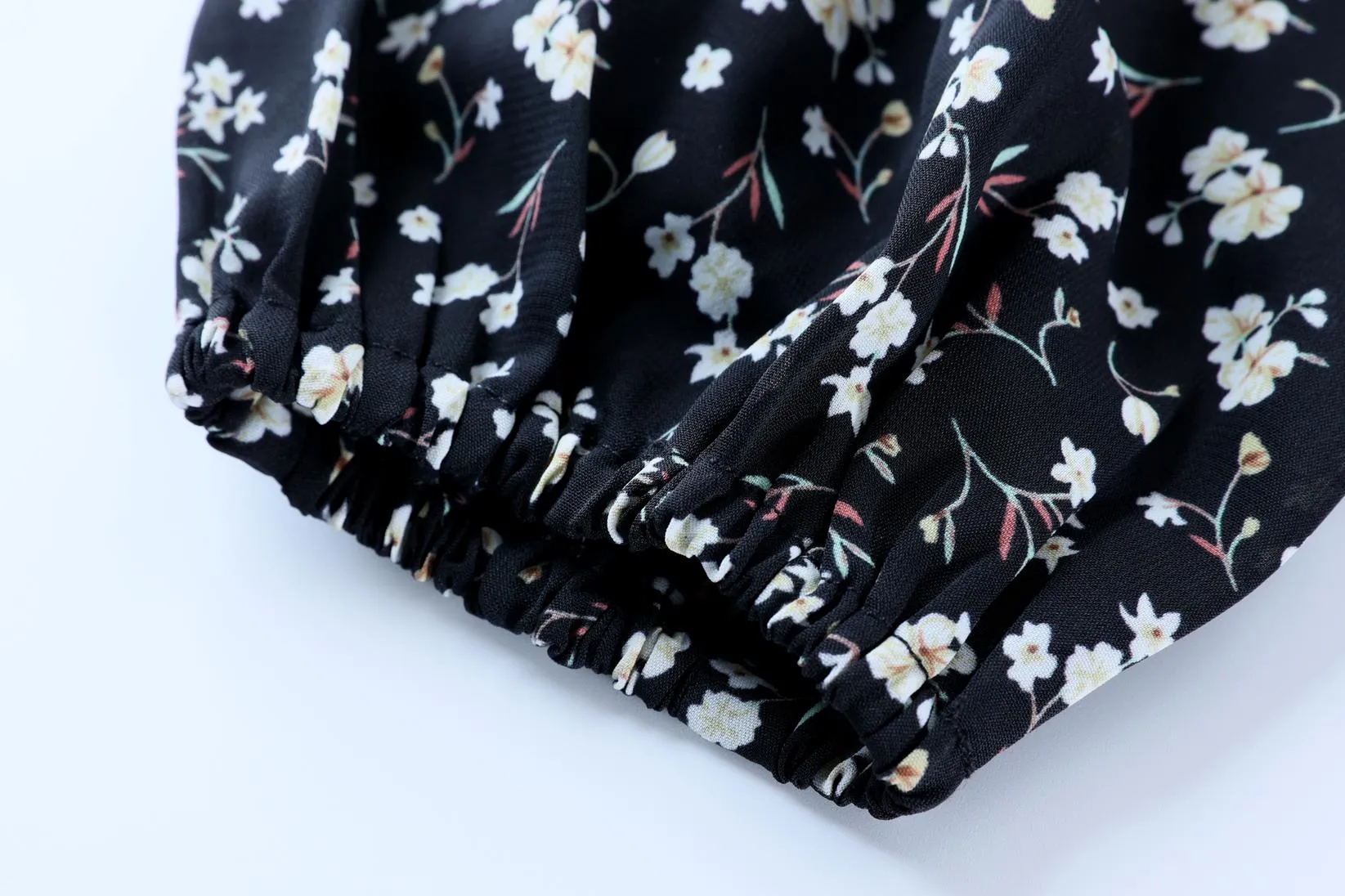 Stunning V-Neck Black Tea Tea Dress with Floral Design