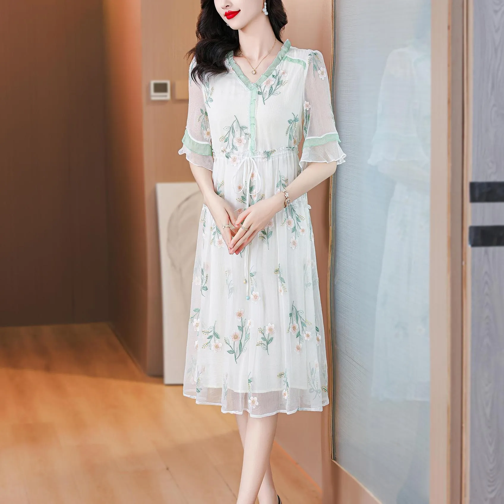 Stylish Mid-Length Embroidered Dress featuring Ruffle Neckline and Mesh
