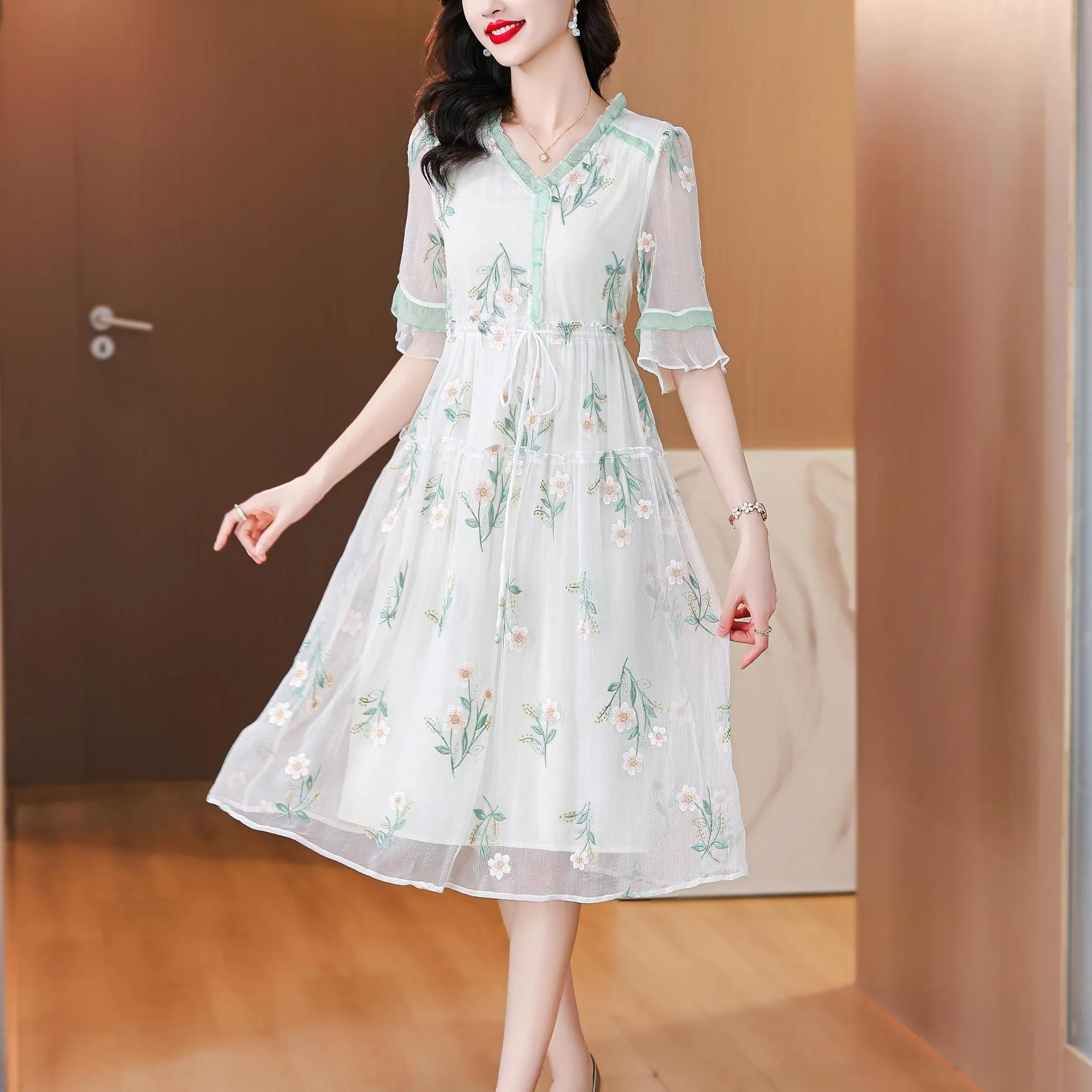 Stylish Mid-Length Embroidered Dress featuring Ruffle Neckline and Mesh