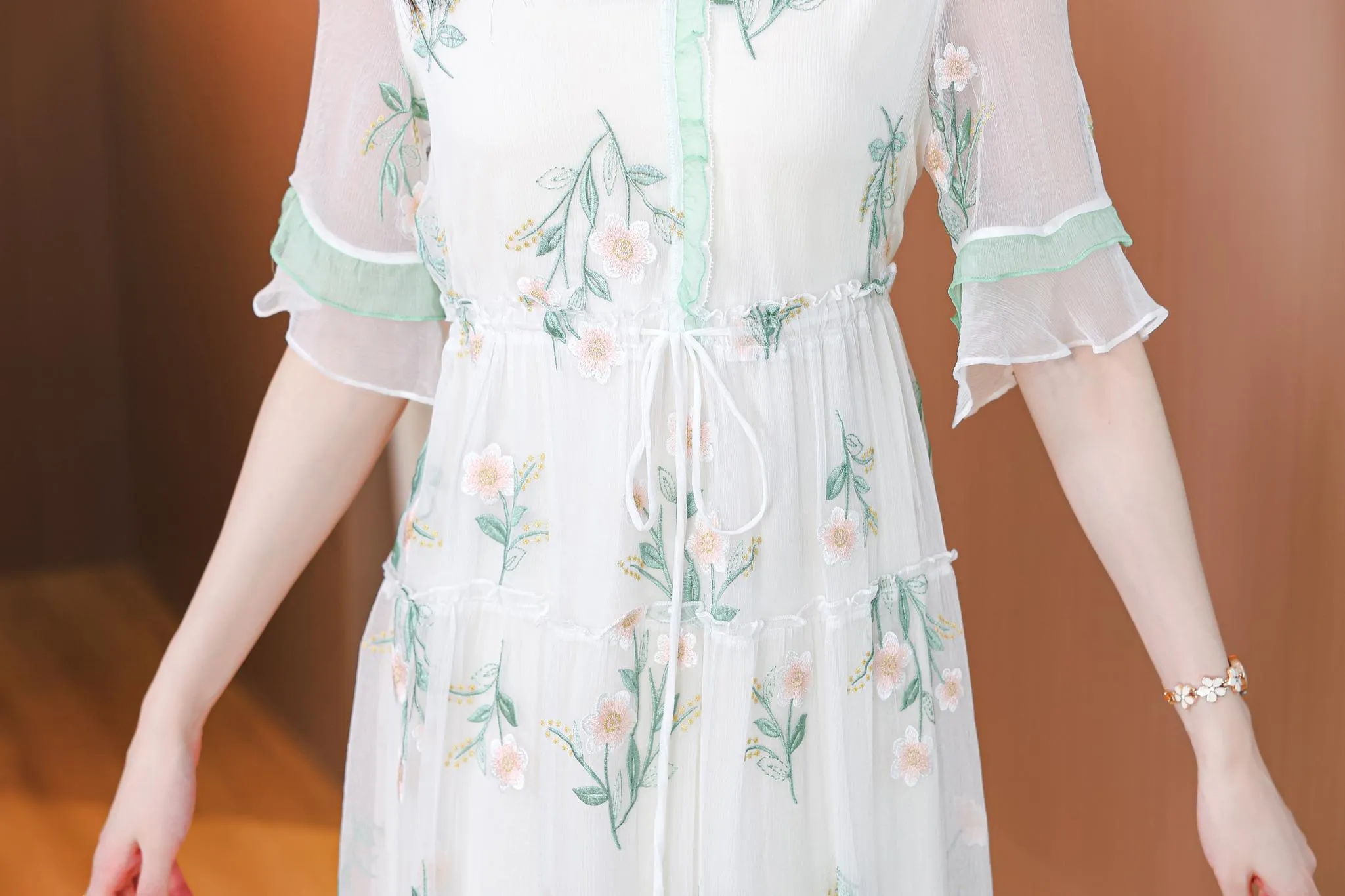 Stylish Mid-Length Embroidered Dress featuring Ruffle Neckline and Mesh
