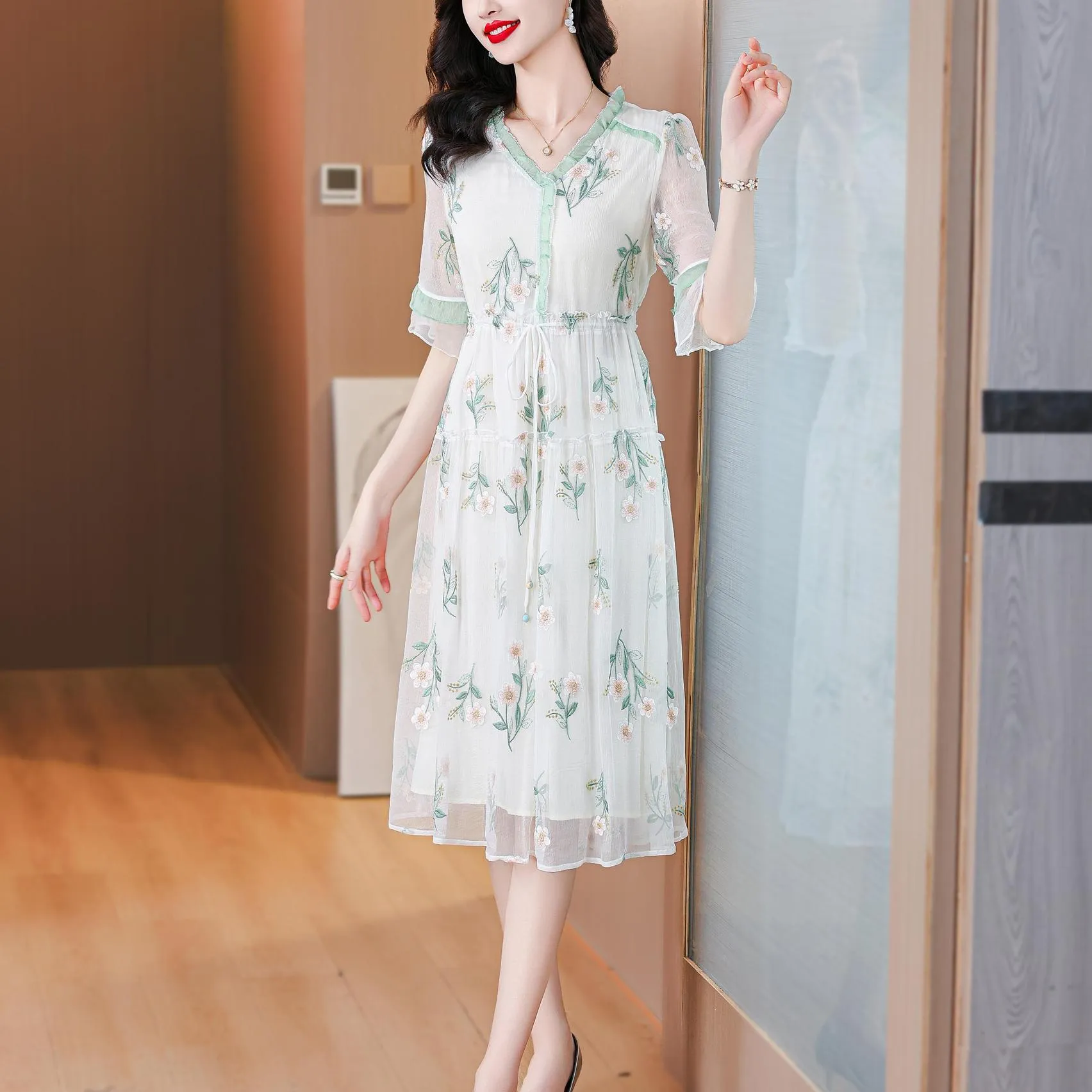Stylish Mid-Length Embroidered Dress featuring Ruffle Neckline and Mesh