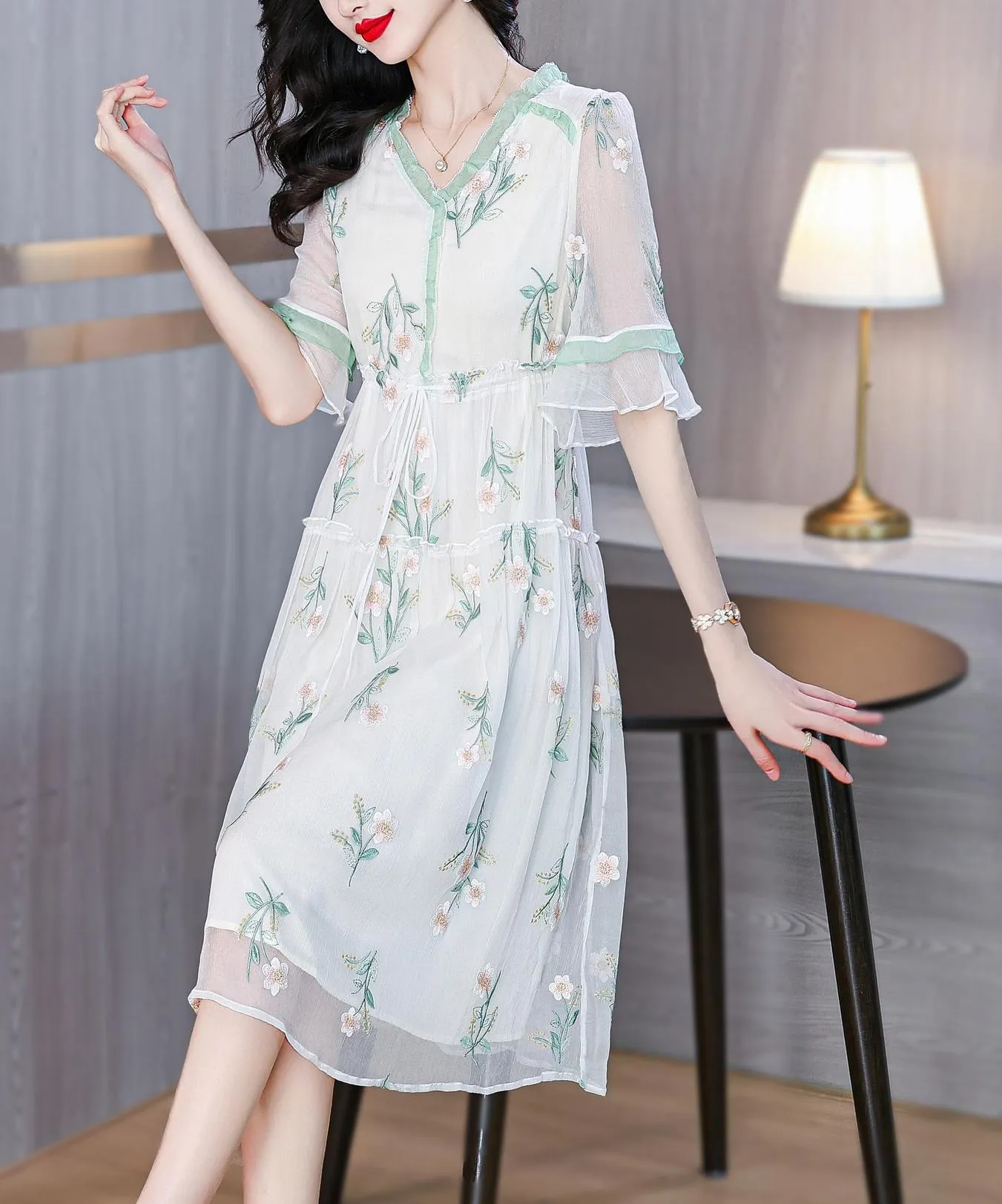 Stylish Mid-Length Embroidered Dress featuring Ruffle Neckline and Mesh
