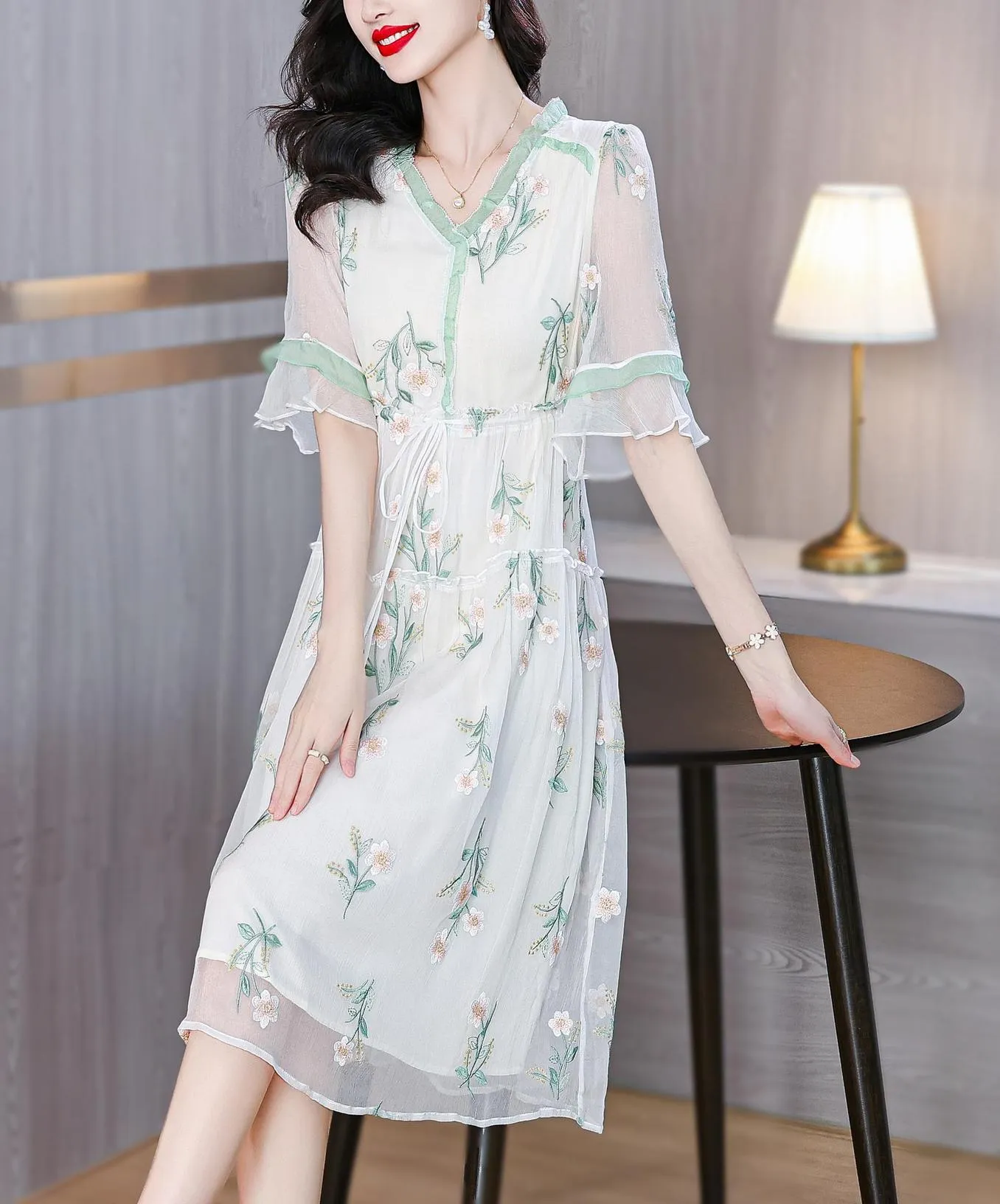 Stylish Mid-Length Embroidered Dress featuring Ruffle Neckline and Mesh