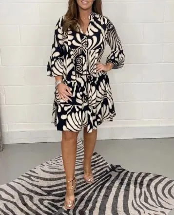 Susanna - Half-length dress with print and flared sleeves